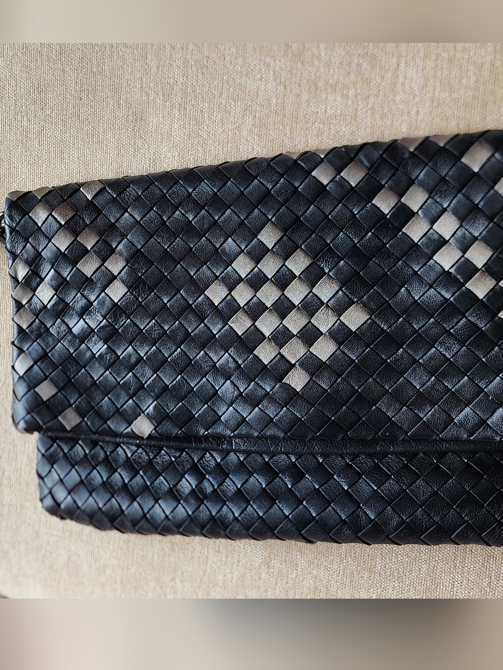 EUC christopher .kon Black And Metallic Grey 100% Woven Leather Clutch